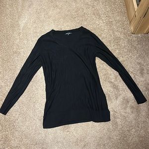 Small back long sleeve. Never worn